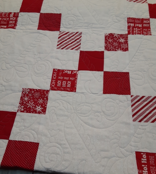 Candy canes on a quilt